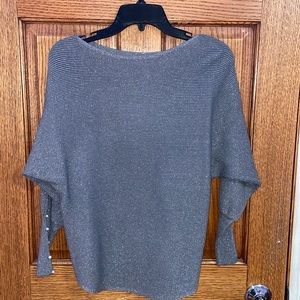 Long sleeve blouse with decorated arms